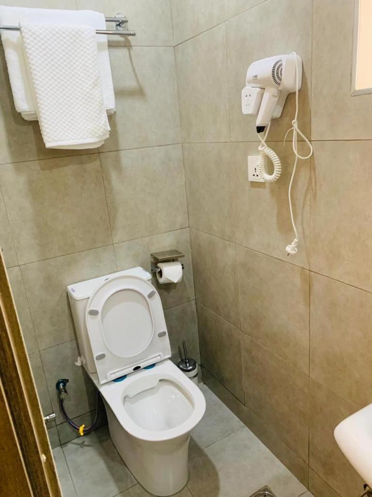 Swiss Pearl Continental Suite Wupa ภายนอก รูปภาพ
